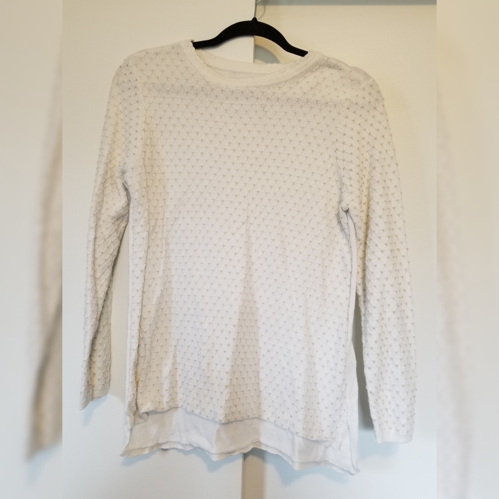 White and gold sweater